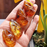 Fossil & Cognac Amber Carved Rabbits Cabochons